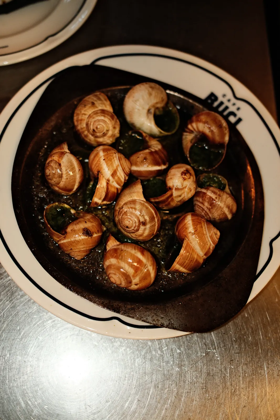 Burgundy snails in the Buci dish